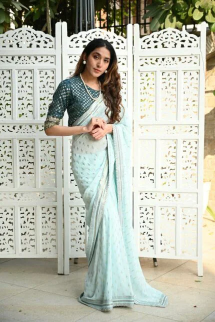 Sky blue light color saree with designer cut blouse fabric