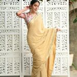 Papaya whip color designer saree with velvet blouse